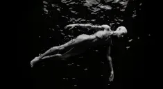 I Float In Dark Waters